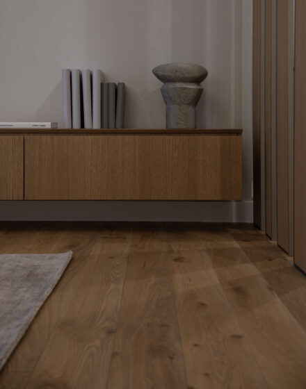 Minimalist Marvels: Elevating Interior with High Quality Wood Flooring & Subtle Geometric Accents