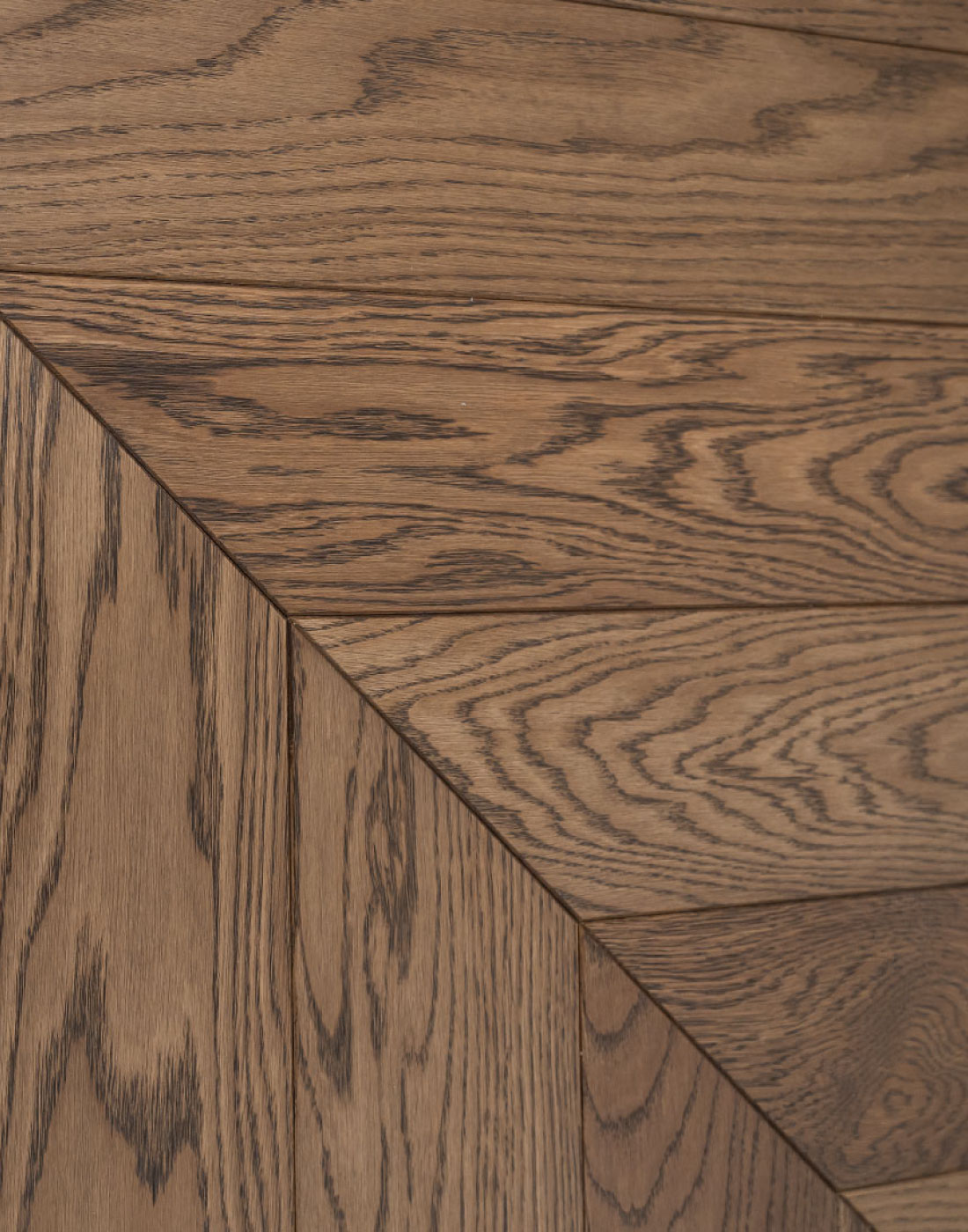 Harmonising Different Spaces with Chevron Parquet