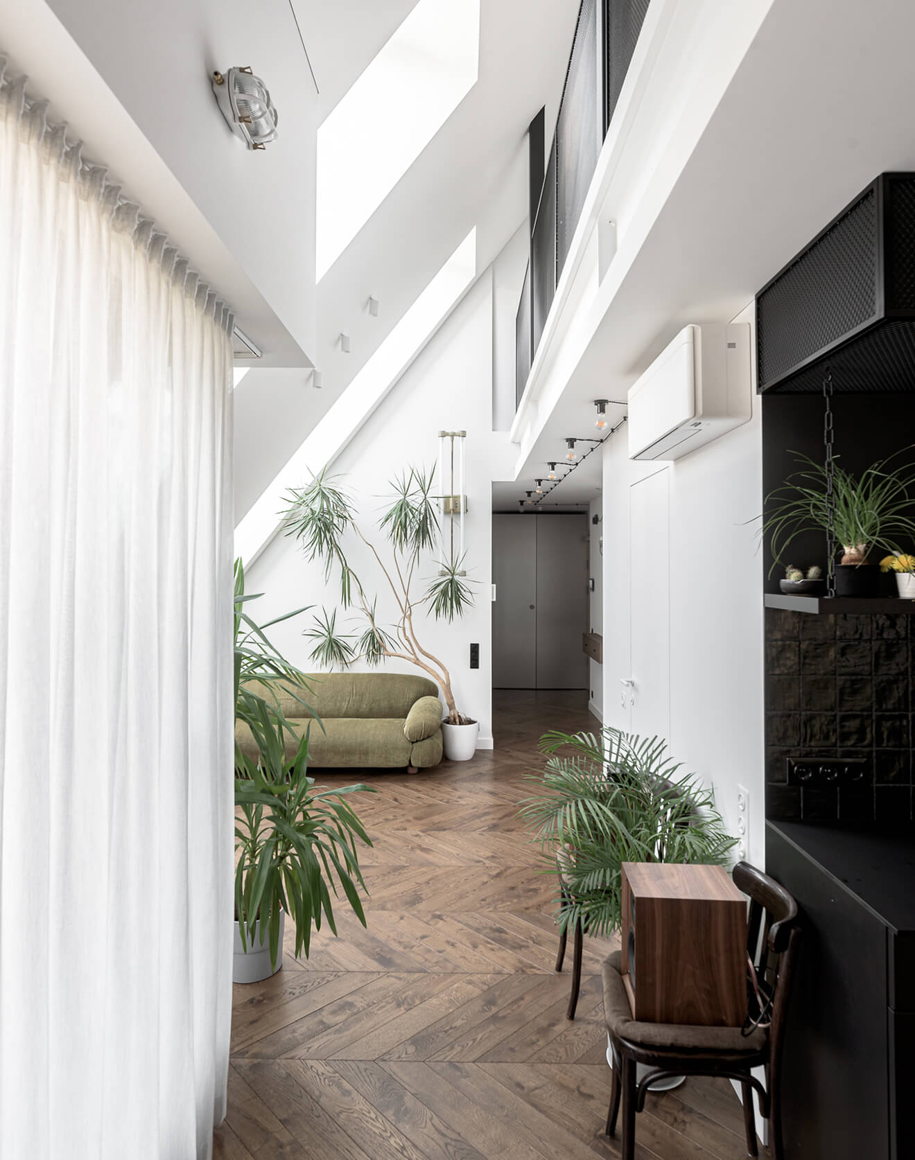Nature Infused Interior From Lithuania, Enhanced by Chevron Flooring