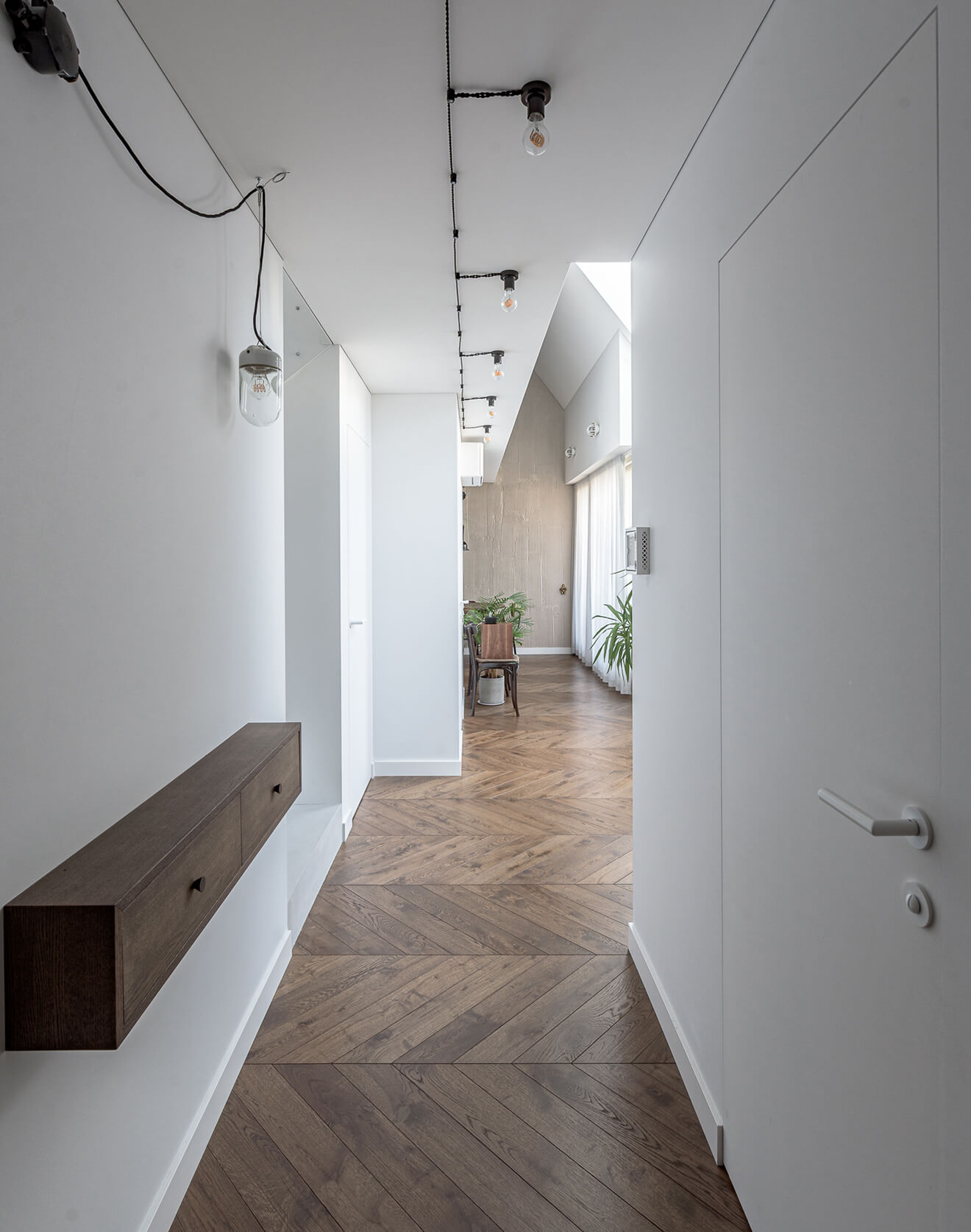 Nature Infused Interior From Lithuania, Enhanced by Chevron Flooring