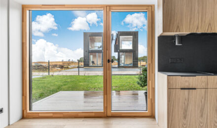 Vacation Vibes Year Round: The Rustic Charm of Oak Flooring at Svencele Dunes Apartments, Lithuania