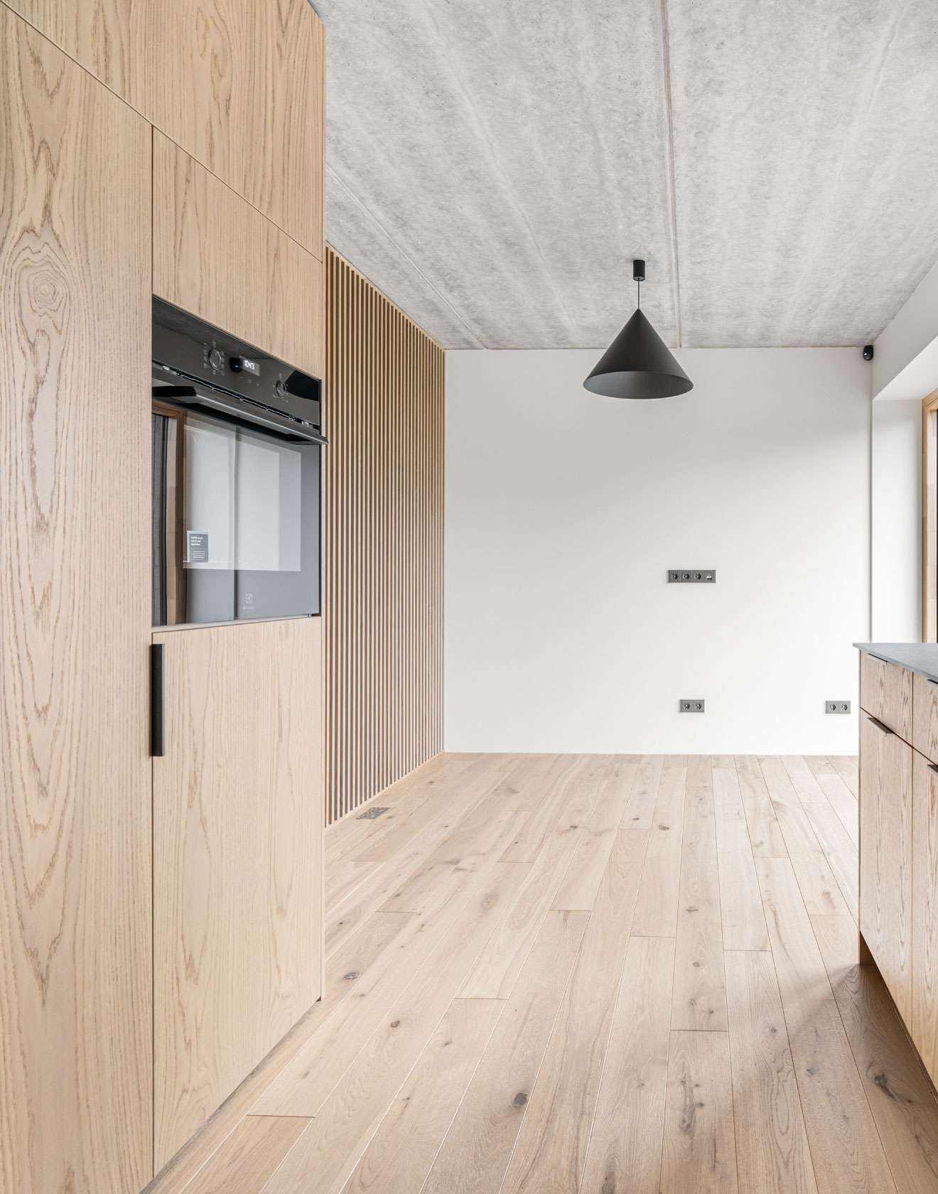 Vacation Vibes Year Round: The Rustic Charm of Oak Flooring at Svencele Dunes Apartments, Lithuania