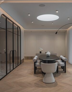 Subtle Dynamics: Chevron Oak Flooring in a Calm, Minimalist Interior