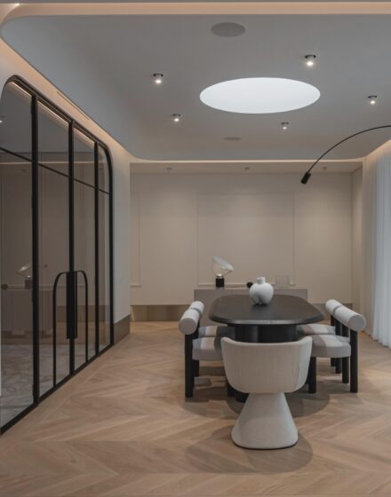 Subtle Dynamics: Chevron Oak Flooring in a Calm, Minimalist Interior