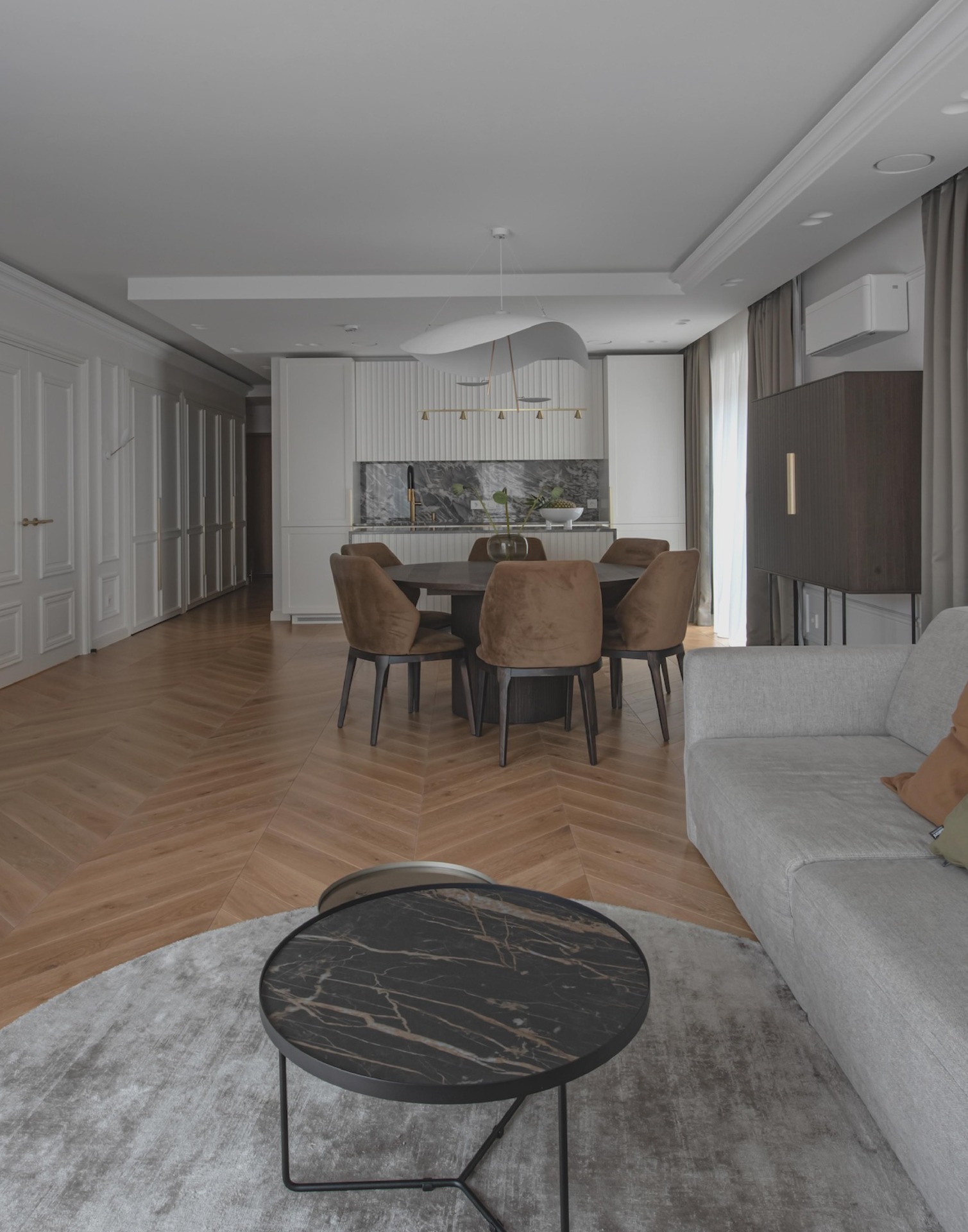 The Rhythm of White: Chevron Oak Flooring as the Heart of the Interior