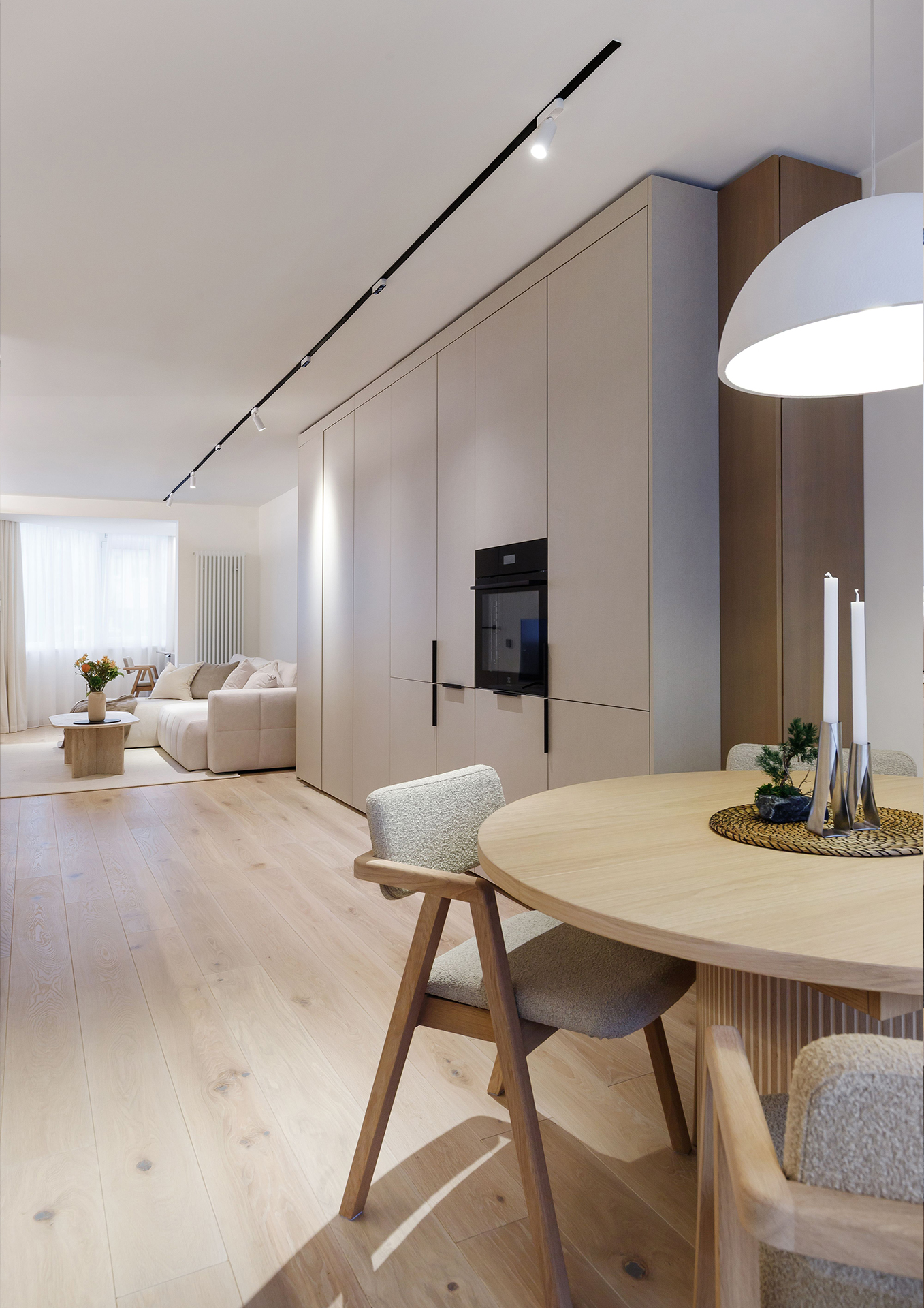 A Harmonious Apartment Defined by Natural Oak