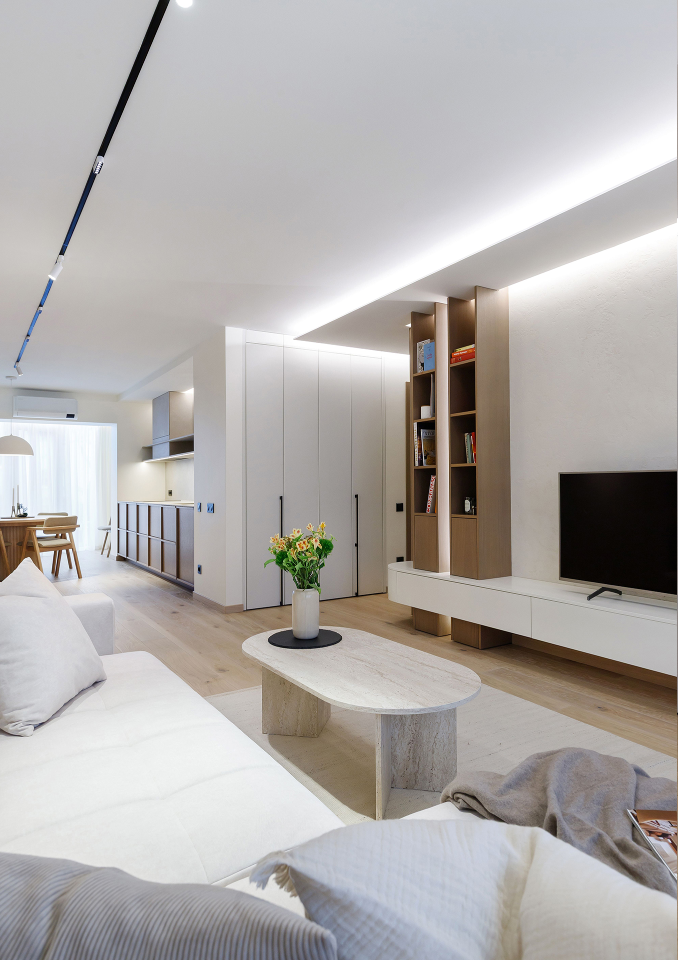 A Harmonious Apartment Defined by Natural Oak