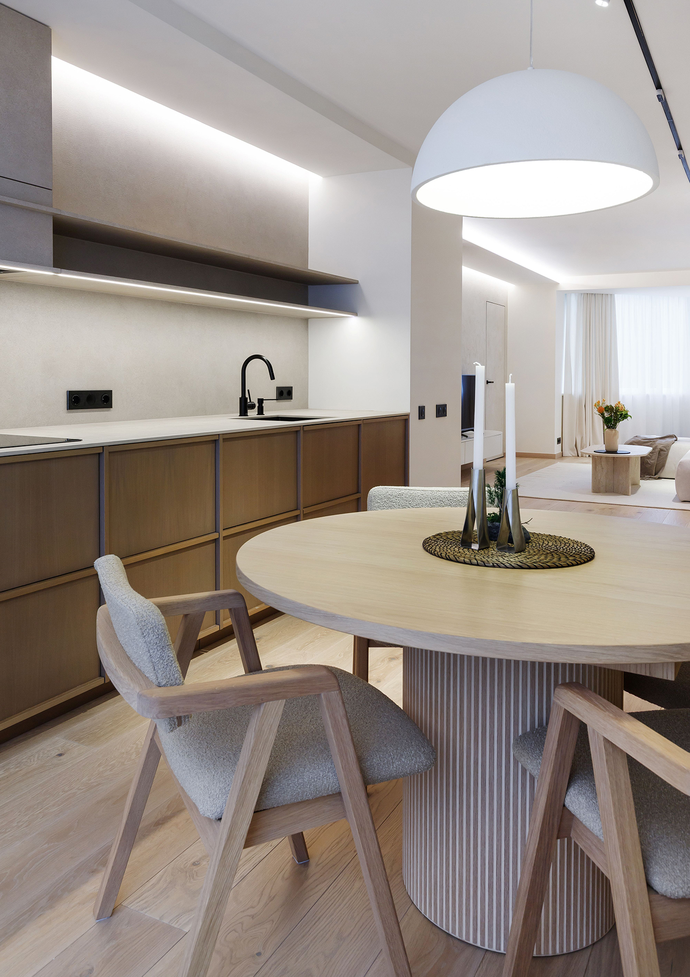 A Harmonious Apartment Defined by Natural Oak